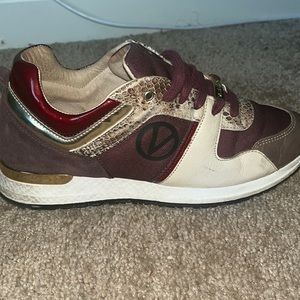 Valentino animal print , with a splash of gold , burgundy and cream